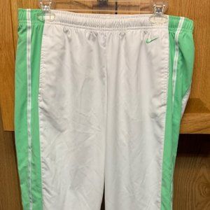 NIKE women’s white with pale green trim capris / size M